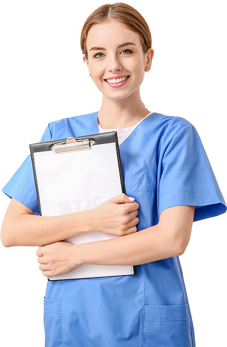a medical worker smiles as she holds a clipboard